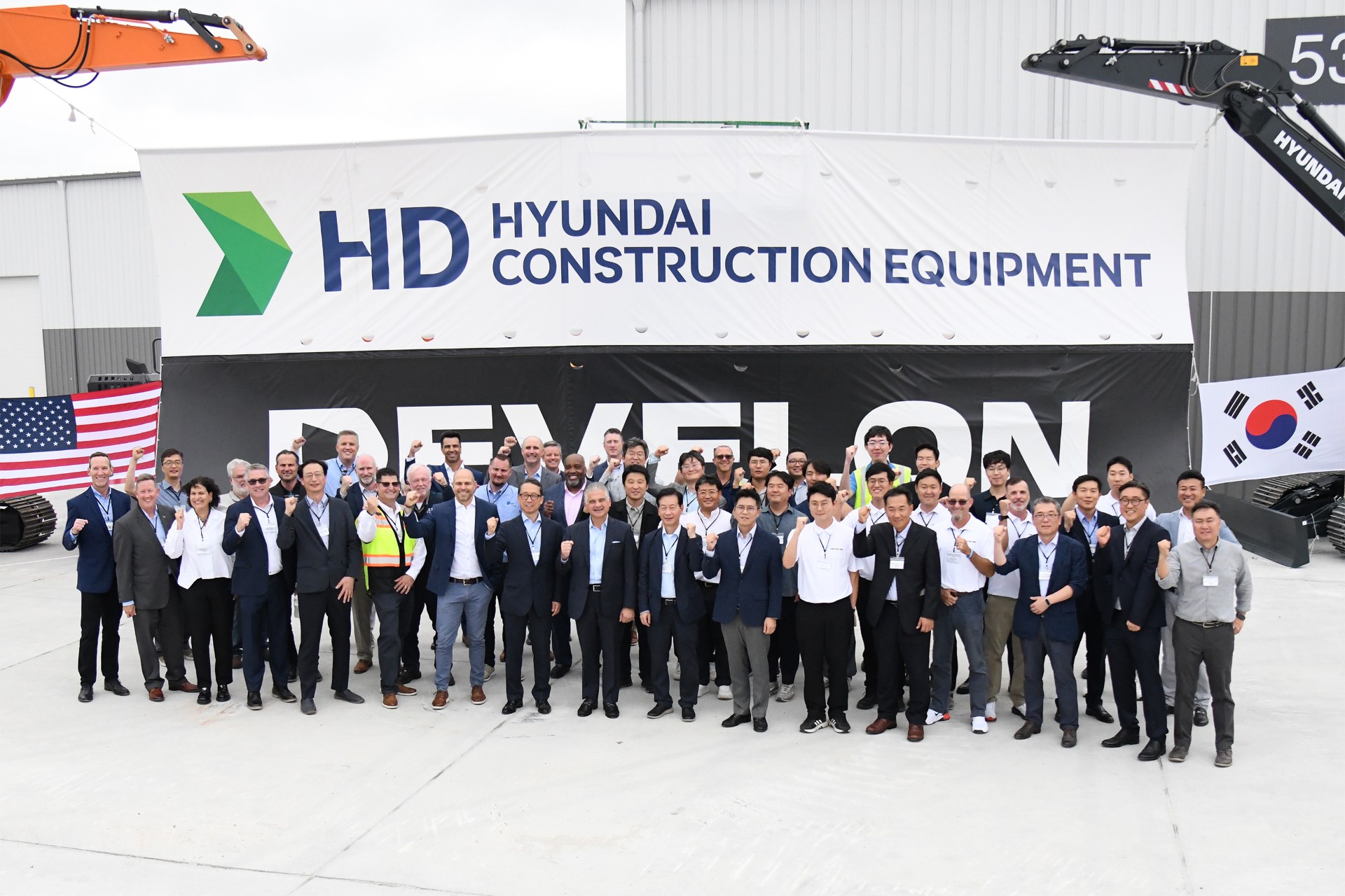 Photo Caption: The attendees posing for a commemorative photo after the opening ceremony of the HD Hyundai Integrated Customization Center at Brunswick, Georgia, USA on the 4th (Wed.) local time. 